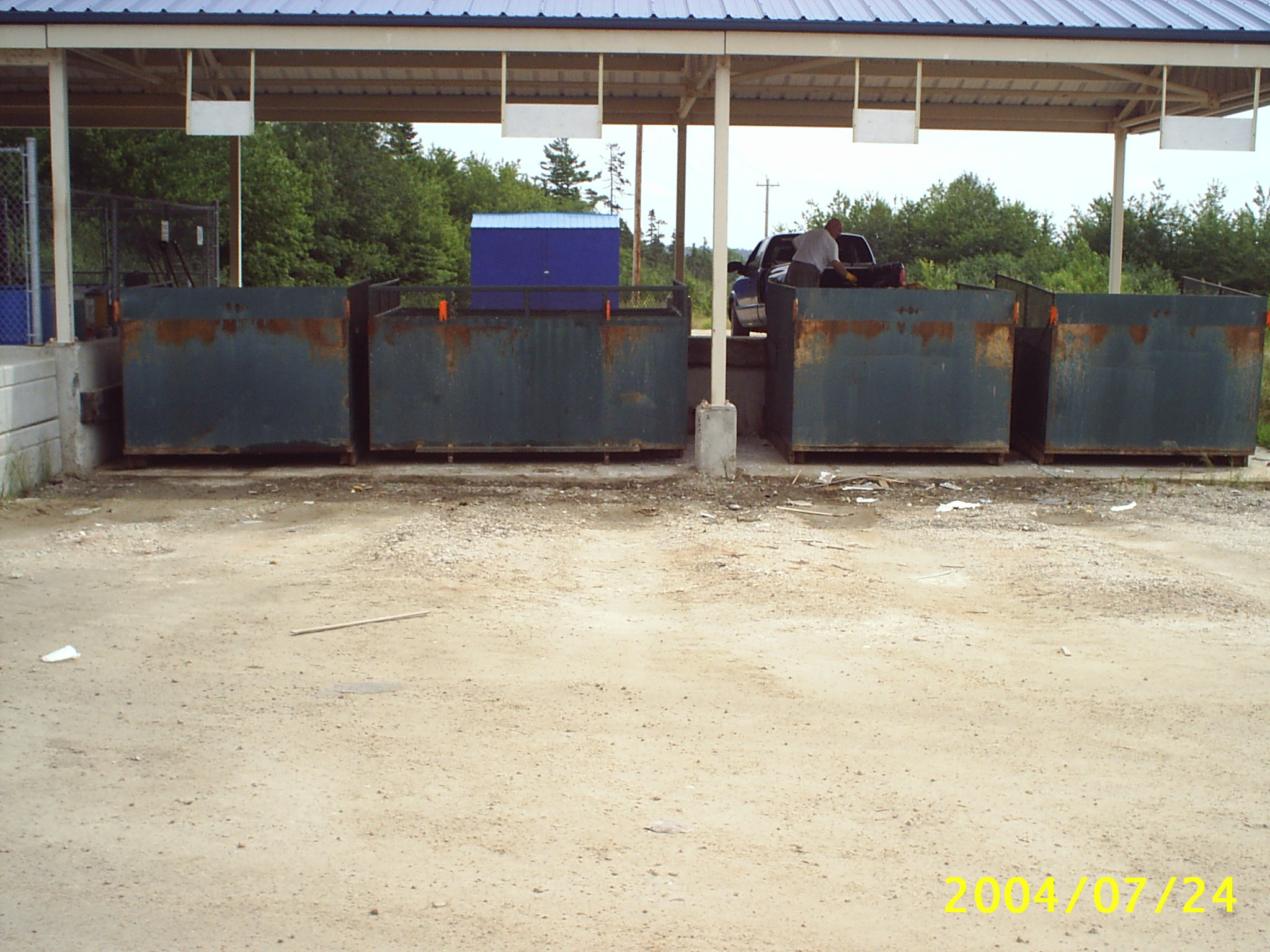 The back end of the public drop off at Kaizer Meadow Landfill with three large bins for waste