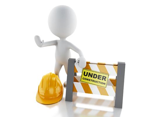Stick person holding up its hand in a stop motion with an yellow hardhat at its feet standing beside a barricade with yellow and white stripes on it.