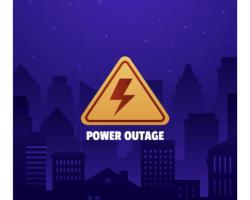 Yellow hazard sign with red lightning bolt that reads power outage 