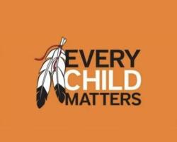 “Every child matters” in an orange background beside two black and white feathers