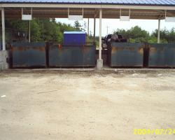 The back end of the public drop off at Kaizer Meadow Landfill with three large bins for waste